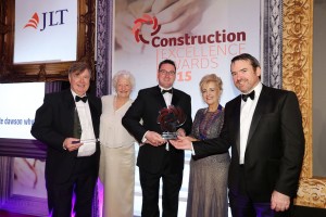 Mr Eamon O’Hare (left), Managing Director of O’Hare and McGovern and Mr Seanie O’Hare, Contracts Manager (centre) receiving the overall winner’s award at the Construction Excellence Awards 2015 ceremony hosted by the Construction Employers Federation (CEF) in recognition of firm’s work on the new Wellcome-Wolfson Institute for Experimental Medicine building at Queen’s University, Belfast. It was presented by Dame Mary Peters, the 1972 Olympic gold winner. Also present were Rhona Quinn (CEF president) and Damien Toner (right), Director of Estates at Queen’s University, Belfast.