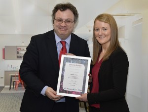 Niamh Lambe from Warrenpoint receiving her Deloitte Human Capital Academy certificate from Minister Farry