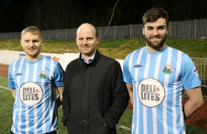 Manager Barry Gray greets the two new signings he captured last night