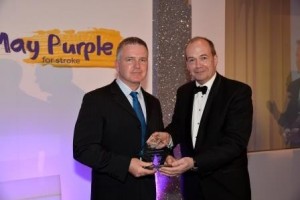 Stroke Northern Ireland Stroke Awards Professioanl Excellence winner Sean Curran with Chief Medical Officer Dr Michael Bride compressed