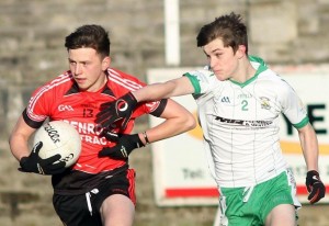 Pete Magee in action for the Minors in their defeat against Burren. Photo| Louis McNally